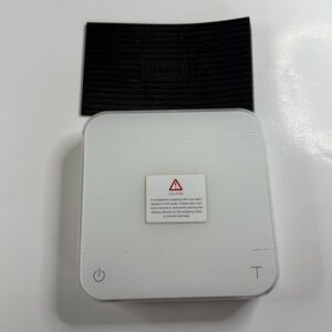 Acaia scale for coffee weighing.